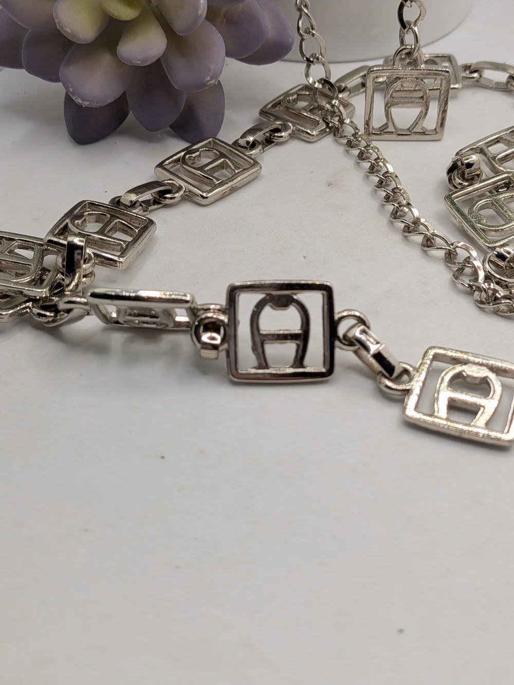 Etienne Aigner elegant silver